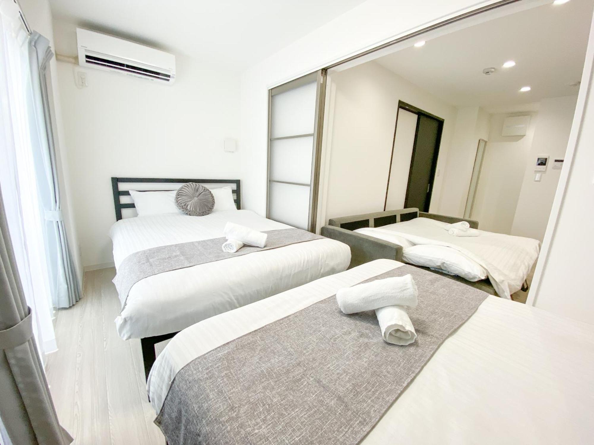 Residential Hotel Glitter Usjまで1駅5分 Osaka Habitación foto